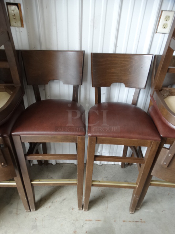 2 Wood Pattern Bar Height Chairs w/ Brown Seat Cushion. Stock Picture - Cosmetic Condition May Vary. 16x17x43. 2 Times Your Bid!