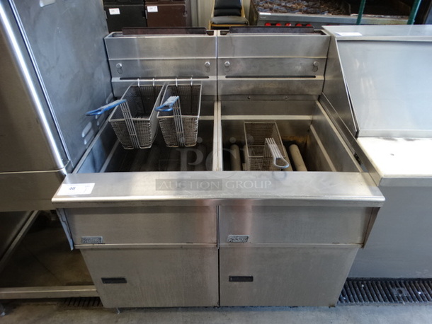 AMAZING! Pitco Frialator Model SG18-JS Stainless Steel Commercial Natural Gas Powered 75 Pound Capacity 2 Bay Deep Fat Fryer w/ 3 Metal Fry Baskets and Filtration System on Commercial Casters. 140,000 BTU. 39.5x34.5x46