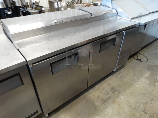 GREAT! 2006 True Model TPP-67 Stainless Steel Commercial Pizza Prep Table w/ 2 Lids and 2 Doors on Commercial Casters. 115 Volts, 1 Phase. 67.5x32x42. Tested and Powers On But Does Not Get Cold