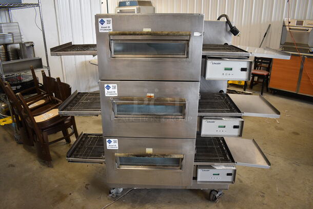 3 GORGEOUS! LATE MODEL! Lincoln Impinger Model 1132-002-U-K1841 Stainless Steel Commercial Electric Powered Conveyor Pizza Ovens on Commercial Casters. 208 Volts, 3 Phase. 69x44x62. 3 Times Your Bid!
