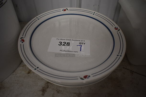 7 White Ceramic Plates. 10.5x10.5x1. 7 Times Your Bid!