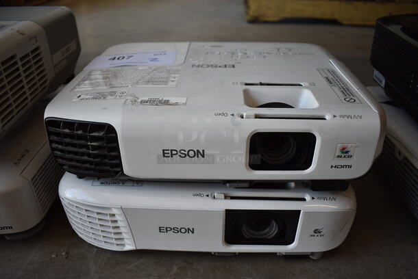 2 Epson LCD Projectors; Models H552F and H860A. 100-240 Volts, 1 Phase. 11.5x9x3.5. 2 Times Your Bid!