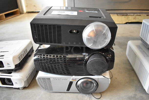 3 Projectors; ViewSonic VS15950, Optoma, Dell. 100-240 Volts, 1 Phase. Includes 12x10x5. 3 Times Your Bid!