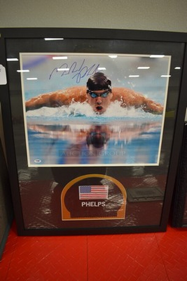 AWESOME! Signed Michael Phelps Picture With Swim Cap. Comes with Certificate of Authenticity. 26x1x32.5 - Image 1 of 12