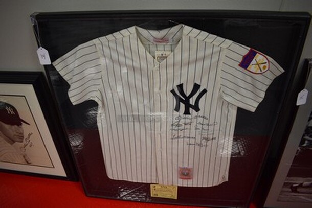 AMAZING! Cooperstown Collection New York Yankee Jersey Autographed by Ted Williams, Mickey Mantle, Eddie Matthews, Reggie Jackson, Frank Robinson, Willie Mays, Harman Killebrew, Mike Schmidt, Hank Aaron, Ernie Banks, and Willie McCovey. 500 Homerun Jersey. Comes with Certificate of Guarantee! 36x2x39