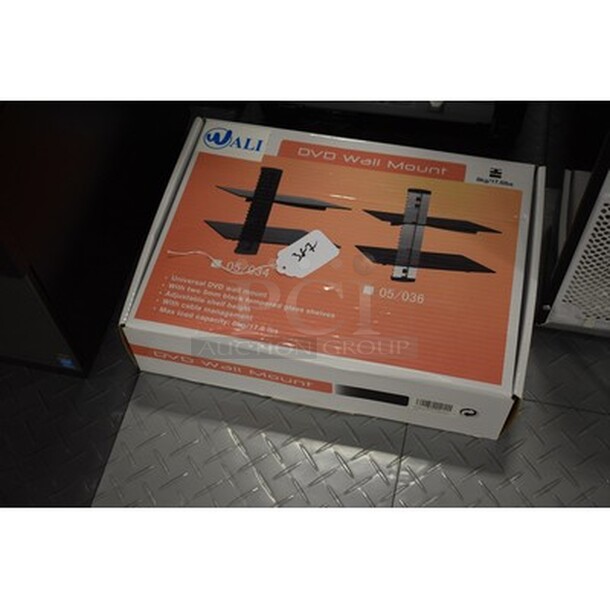 STILL IN BOX! DVD Wall Mount  - Image 2 of 3