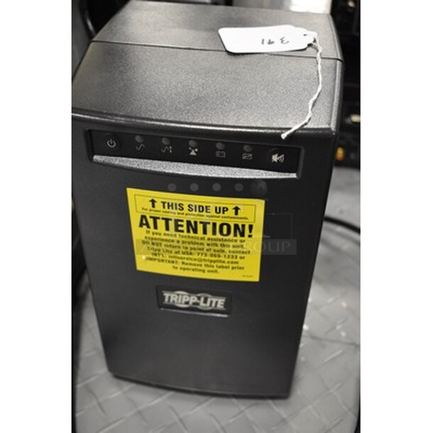 Tripp-Lite Smart 750 Battery Charger and Surge Protector! - Image 1 of 4
