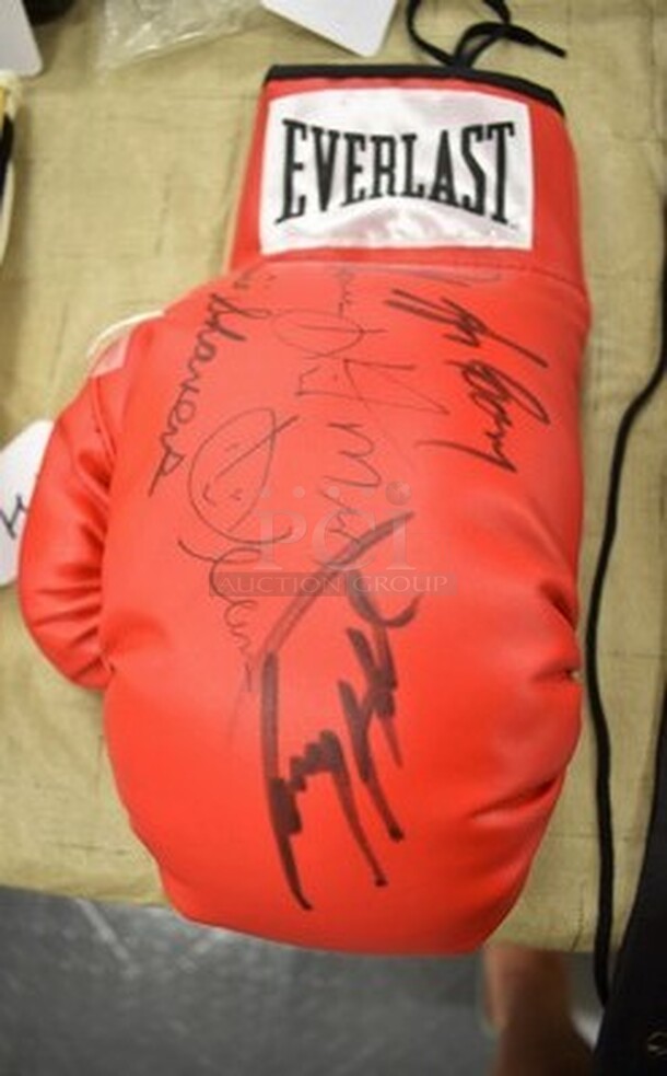 AMAZING! Boxing Glove Autographed by Larry Holmes, Earnie Shavers, and More! Comes With Certificate Of Authenticity! 