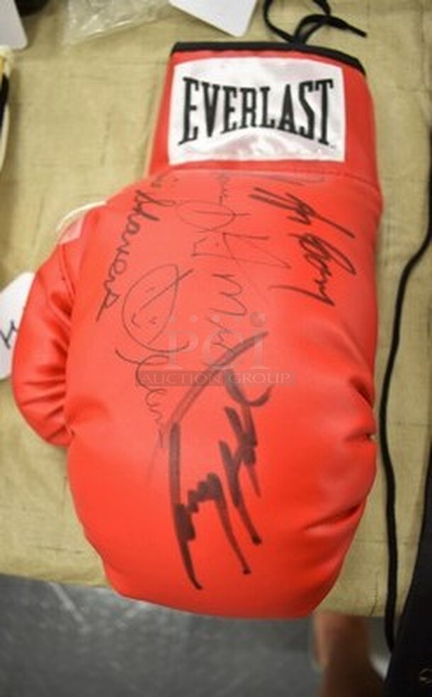 AMAZING! Boxing Glove Autographed by Larry Holmes, Earnie Shavers, and More! Comes With Certificate Of Authenticity!  - Image 1 of 5