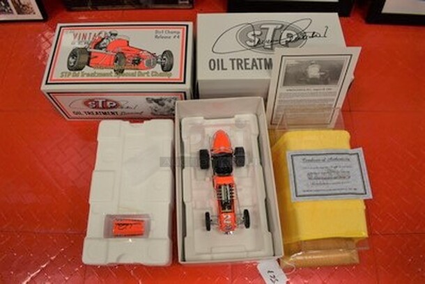 IN ORIGINAL BOX! Mario Andretti/STP Oil Treatment Dirt Champ. 8/4200. Comes With Certificate of Authenticity!