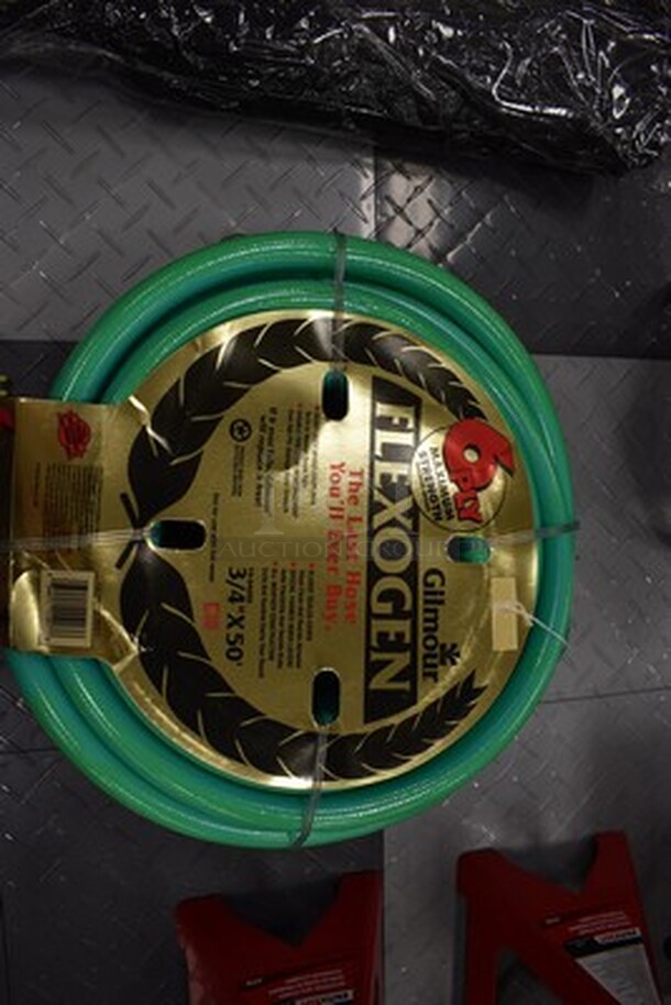 BRAND NEW! Gilmour Flexogen 50 ft Hose With Heavy Duty Brass Couplings and Gun Nozzle.  - Image 1 of 5