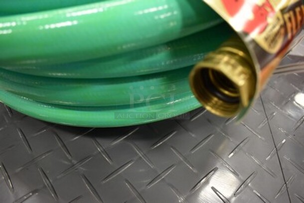 BRAND NEW! Gilmour Flexogen 50 ft Hose With Heavy Duty Brass Couplings and Gun Nozzle.  - Image 3 of 5