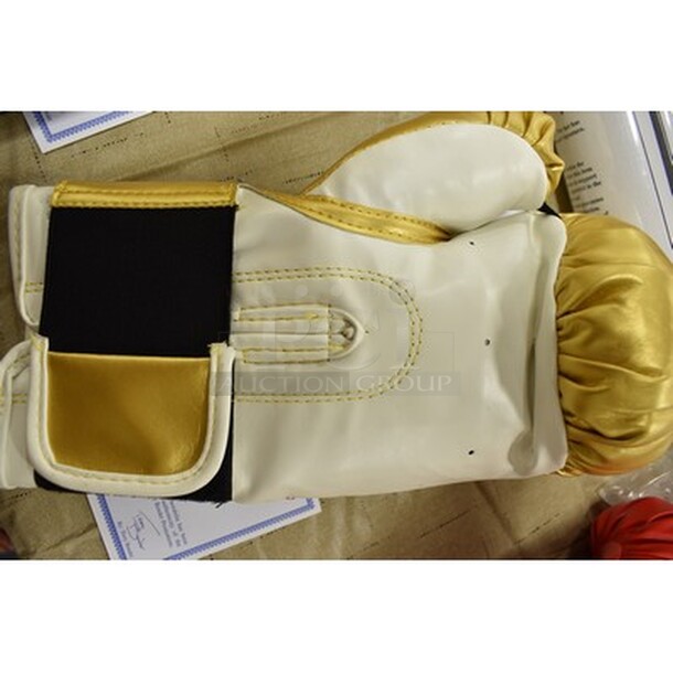 Gold Colored Boxing Glove Signed By Larry Holmes! Comes With Certificate of Authenticity!  - Image 5 of 6