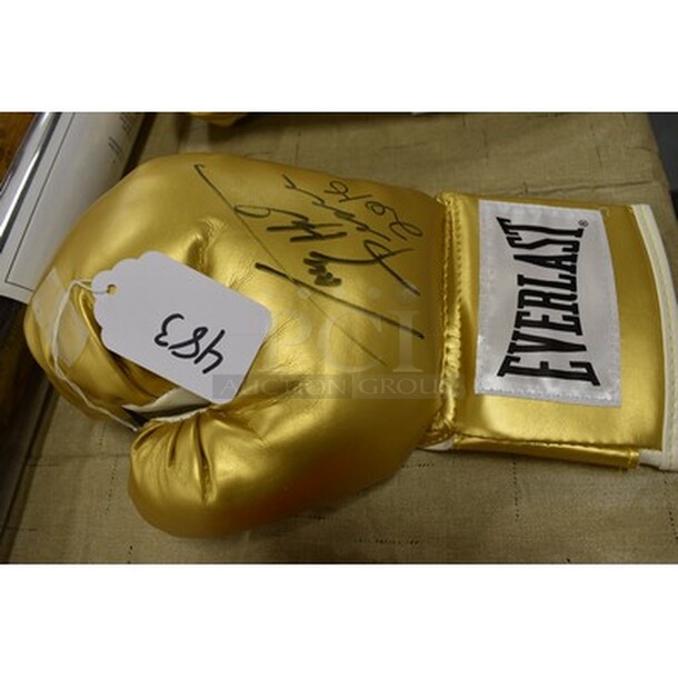 Gold Colored Boxing Glove Signed By Larry Holmes! Comes With Certificate of Authenticity!  - Image 3 of 5