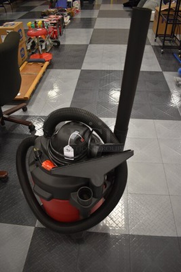 16 Gallon Wet/Dry Shop Vac Model 6060 on Wheels. Comes With Various Attachments. 120V, 60HZ. 14x14x47. Tested and Working!