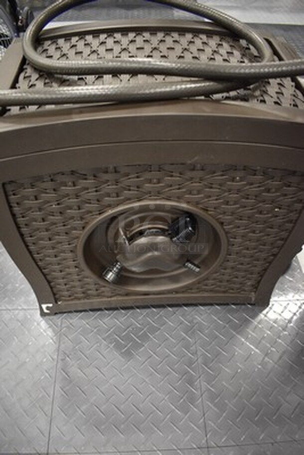 Brown Hideaway Hose Reel. Comes With Hose and Spray Nozzle. 21x12x21 - Image 1 of 5