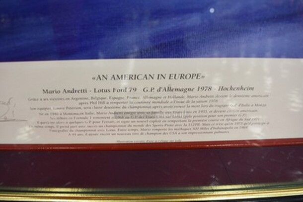 STUNNING! Benoit Deliege "An American In Europe Painting" Mario Andretti Lotus Ford 79. Autographed By Benoit Deliege and Mario Andretti!. 30x1x23. - Image 5 of 5