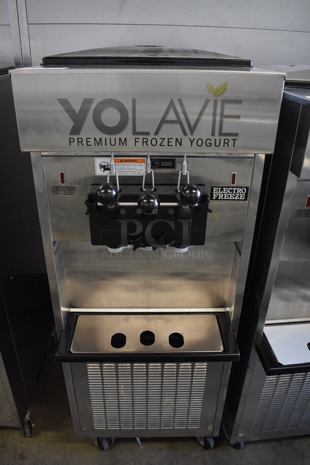 GORGEOUS! 2012 Electro Freeze Model SL500-132 Stainless Steel Commercial Floor Style Water Cooled 2 Flavor w/ Twist Soft Serve Ice Cream Machine on Commercial Casters. 208-230 Volts, 3 Phase. 22x34x60