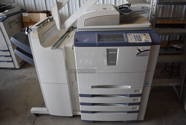 Toshiba Model eStudio 556 Floor Style Copier Printer w/ Attached Finisher. 54x31x50