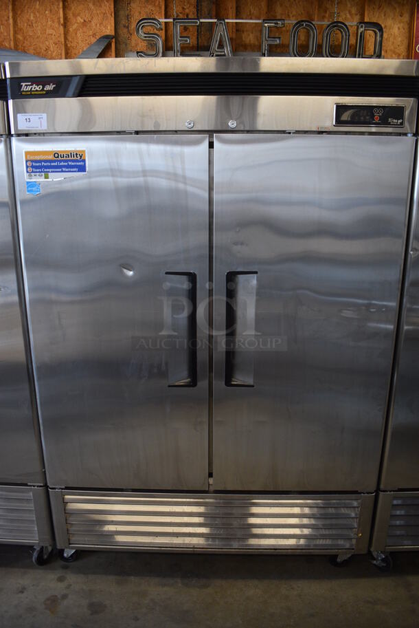 SWEET! 2013 Turbo Air Model TSR-49SD ENERGY STAR Stainless Steel Commercial 2 Door Reach In Cooler w/ Metal Racks on Commercial Casters. 110-120 Volts, 1 Phase. 55x30.5x83.5. Tested and Working!
