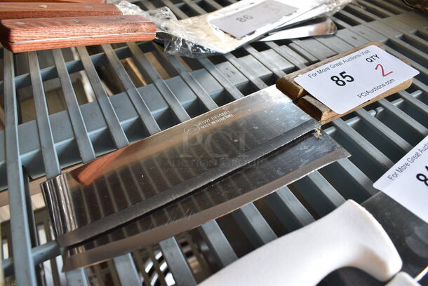 2 Metal Knives w/ Wooden Handles. 12