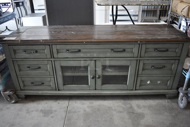 Counter w/ 2 Doors and 7 Drawers. 64x18x25