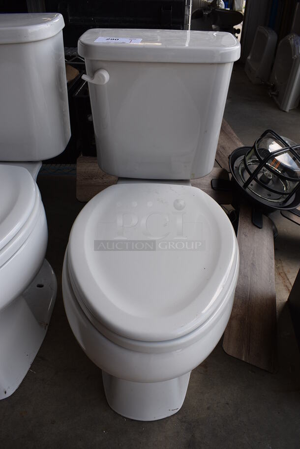 Sterling White Ceramic Toilet. 15x27x31