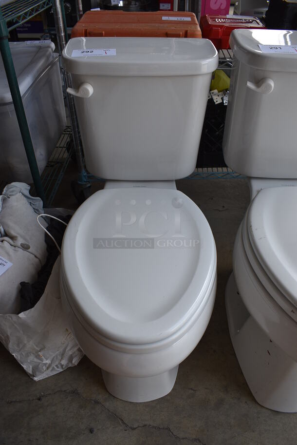 Sterling White Ceramic Toilet. 15x27x31