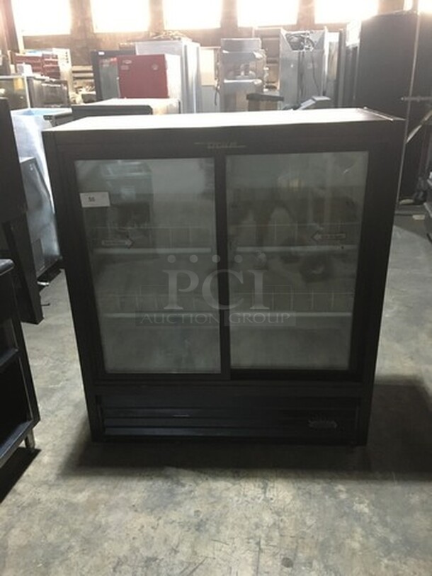 True Commercial Reach In Refrigerator Merchandiser! With 2 Sliding Doors! With Poly Coated Racks! Model GDM41SL54 Serial 13058700! 115V 1Phase!
