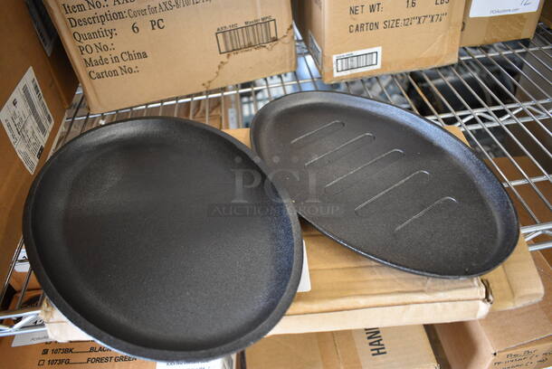 2 BRAND NEW IN BOX! Cast Iron Dishes. 11x7x1, 12x8x1. 2 Times Your Bid!