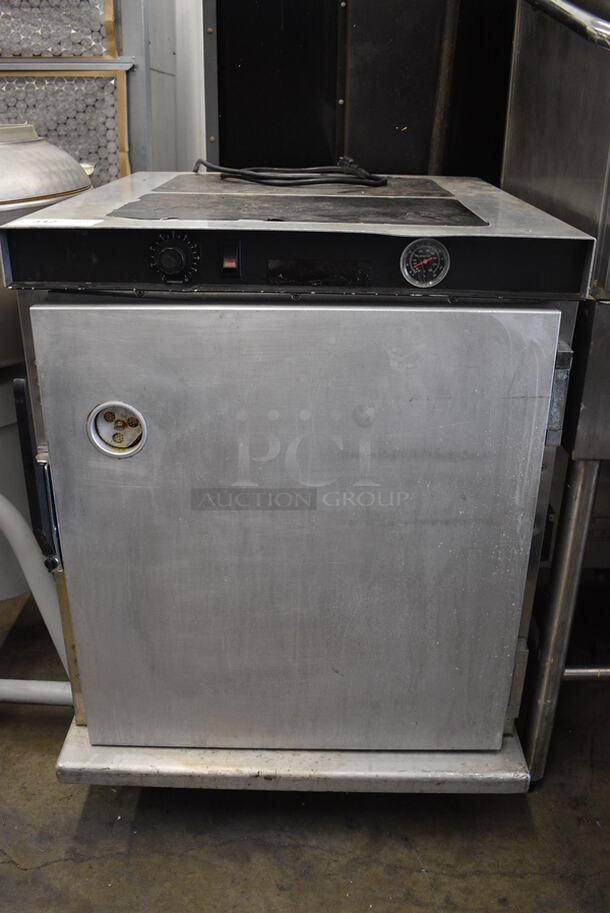 CresCor Model H339UA8C Metal Commercial Single Door Holding Cabinet on Commercial Casters. 120 Volts, 1 Phase. 27x32x37. Tested and Does Not Power On