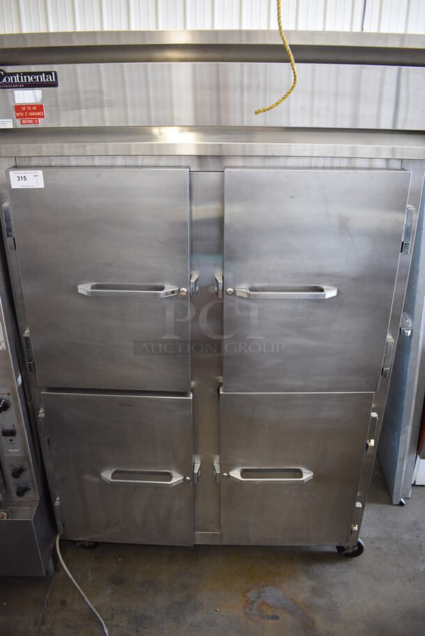 AWESOME! Continental Model DL2R-SA-HD Stainless Steel Commercial 4 Half Size Door Reach In Cooler on Commercial Casters. 115 Volts, 1 Phase. 52x34x83. Tested and Powers On But Does Not Get Cold