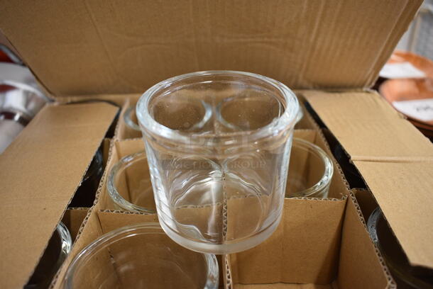 24 BRAND NEW IN BOX! Update Glass Condiment Jars. 3x3x2.75. 24 Times Your Bid!