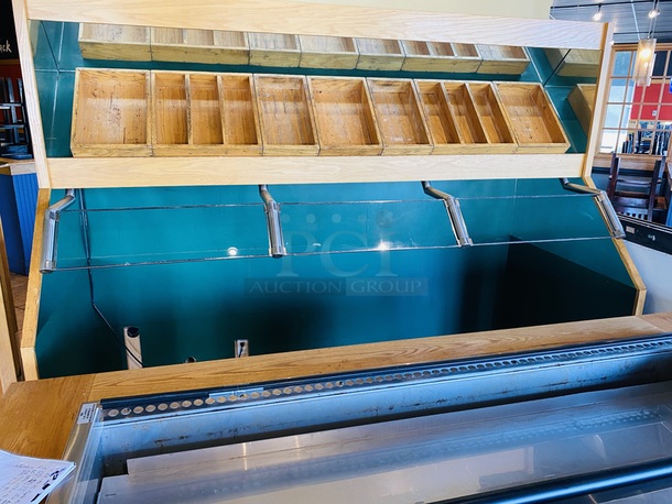 BEAUTIFUL!! Delfield N8182-FA, Forced Air Cold Pan Drop-In Unit. In Perfect Working Order. Unit holds up to (6) 12x20 Pans, 3/4 HP, 14.8Amp, 115v, 5-20 Nema Plug.     Lot Consists of: Solid Wood Serving Station, Free Standing Produce Bar with Forced Air Cold Pan Drop-In Unit on Commercial Casters, 3 Pane Glass Sneeze Guard Mounted Underneath Mirrored Angled Storage Shelf with 13 Stylish Open Top Wood Containers. Includes Extra Glass Panes. Delfield N8182-FA, Forced Air Cold Pan Drop-In Unit - 82.25” x 26.67” x 28.62” - hold up to (6) 12x20 Pans, 3/4 HP, 14.8Amp, 115v, 5-20 Nema Plug. Produce Bar is plated with stainless steel to protect the wood surface and allow for ease in sliding tray and cleaning. Overall dimensions: 103-1/2x44x72 Produce Bar/Cabinet: 100x45-1/2x33.  This piece is located on site in Modesto, CA. Shipping or Pick-Up Available. Winning Bidder must Contact PCI Auctions Southwest by 26-AUG-2020 with Arrangements for pick-up or shipping. Pick-Up for this items will not  - Image 8 of 9