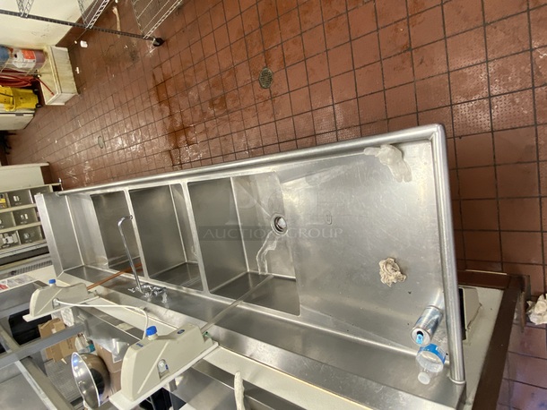 HUGE! 124" 16-Gauge Stainless Steel 3 Compartment Sink with 2 Drainboards - 24" x 24" x 14" Bowls, Back and Left Side Splash Guards, Faucet, Plumbing and Waste Drain Valve. Overall Dimensions: Width: 124" Depth: 30" Height: 43" Work Surface Height: 36 1/2" Backsplash Height: 7 1/4" Bowl Dimensions: Left to Right: 24" Front to Back: 24" Depth: 14"     This item is located onsite in Modesto California. Shipping is Available. Pick-up will be available the weekend of the 28-AUG-2020. Arrangements for Shipping or Pick-up Must be made by 26-AUG-2020. - Image 2 of 3