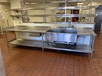 BEAUTIFUL! Stainless Steel Prep Station/Table with 2 Compartment Prep Sink  13' -0"x30"x41", all welded construction, NSF. 16 gauge, 304 stainless steel top w/6" backsplash, 18 gauge, stainless steel undershelf, stainless steel legs and adjustable stainless steel feet. with 2 (LARGE) Bay Sink, Faucet, Plumbing, Storage Drawer and Under-shelf. 13ft x 30" x 41 inches (to top of backsplash).   B-2424 Fabricated sink bowl, 24" front-to-back x 24" Wide x 12" Deep, 14 gauge, 304 stainless steel.  Roller bearing drawer, 20" x 20", stainless steel removable pan.  (2) Twist Handle Lever drains, 2" drain outlet        This piece is located on site in Modesto, CA. Shipping or Pick-Up Available. Winning Bidder must Contact PCI Auctions Southwest by 26-AUG-2020 with Arrangements for pick-up or shipping. Pick-Up for this items will not be until the weekend of 28-AUG-2020.
