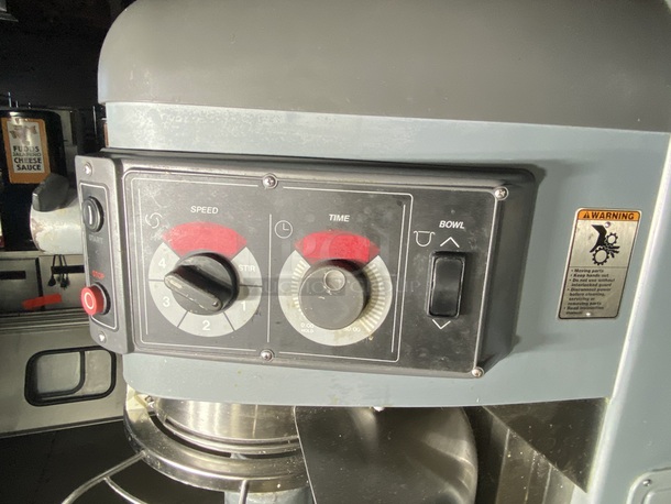 BEAUTIFUL! Hobart HL600 Legacy 60 Quart Mixer with power bowl assist. 200-240V 50/60Hz 18.0 (1 Phase) Amps 10.0 (3 Phase) Amps. FEATURES: ■ Heavy-Duty 2.7 H.P. Motor ■ Gear Transmission ■ Four Fixed Speeds Plus Stir Speed ■ Shift-on-the-FlyTM Controls ■ Patented soft start Agitation Technology ■ 20-Minute SmartTimerTM ■ Automatic Time Recall ■ Large, Easy-To-Reach Controls ■ Single Point Bowl Installation ■ Power Bowl Lift ■ #12 Taper Attachment Hub ■ Open Base ■ Stainless Steel Bowl Guard ■ Metallic Gray Hybrid Powder Coat Finish  **Bowl, Bowl Truck and, Hook Are Not Included - Featured in separate lots** - Image 8 of 9