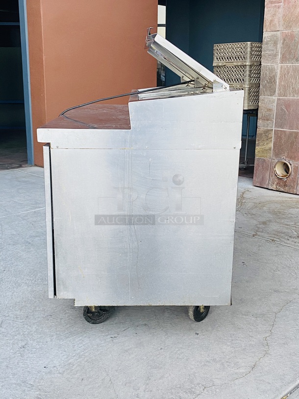 SWEET! 5ft Delfied Refrigerated Salad Prep Table with Cold Rail Unit. 60x31-1/2x42

Observed onsite in working order. Could not test. - Image 2 of 11