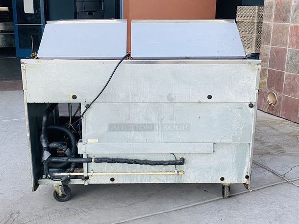 SWEET! 5ft Delfied Refrigerated Salad Prep Table with Cold Rail Unit. 60x31-1/2x42

Observed onsite in working order. Could not test. - Image 3 of 11