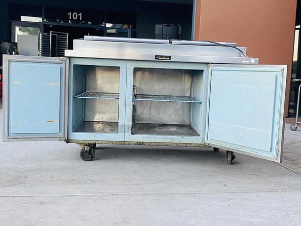 SWEET! 5ft Delfied Refrigerated Salad Prep Table with Cold Rail Unit. 60x31-1/2x42

Observed onsite in working order. Could not test. - Image 7 of 11