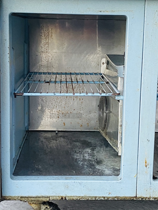 SWEET! 5ft Delfied Refrigerated Salad Prep Table with Cold Rail Unit. 60x31-1/2x42

Observed onsite in working order. Could not test. - Image 8 of 11