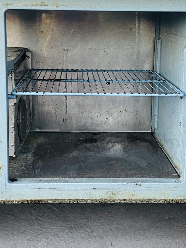 SWEET! 5ft Delfied Refrigerated Salad Prep Table with Cold Rail Unit. 60x31-1/2x42

Observed onsite in working order. Could not test. - Image 9 of 11