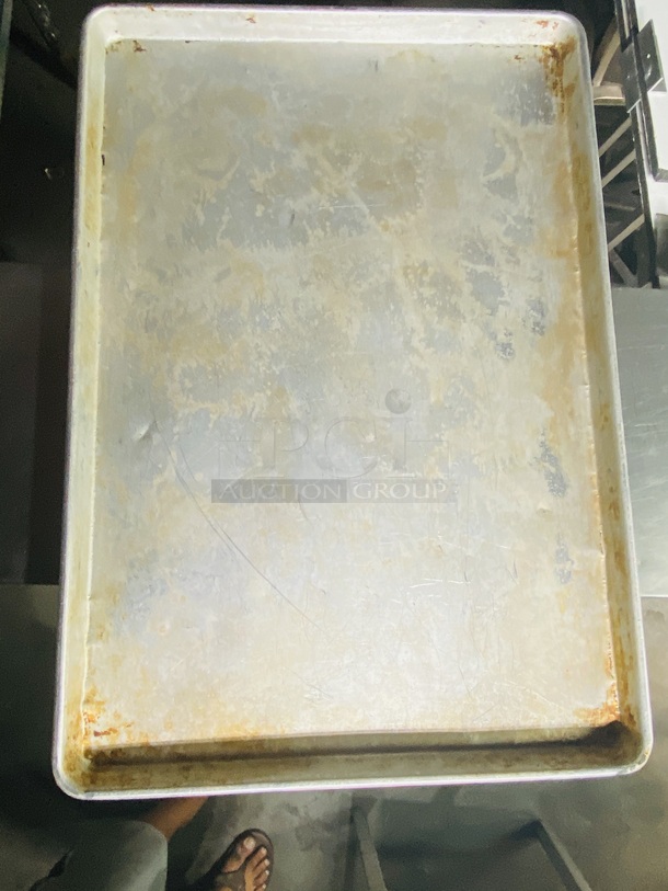 SWEET! Lot of 7 Full Size Sheet Pans.

7x Your Bid