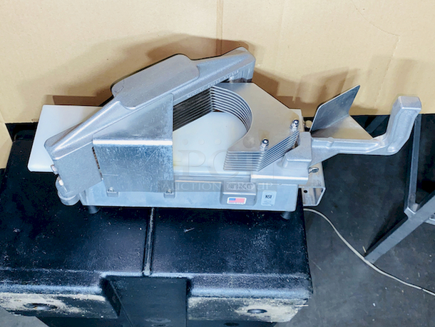 RAZOR SHARP! Nemco 55600-2 1/4" Easy Tomato Slicer and Table Stop.
8x15x8

Razor sharp stainless steel blades create uniform, 1/4" thick slices without squeezing or crushing
Compact, portable design allows for use on any countertop and provides easy storage
Ergonomic vertical handle for effortless slicing
Protective guards keep hands safe during use
Rubber feet prevent slipping to ensure maximum stability - Image 2 of 8