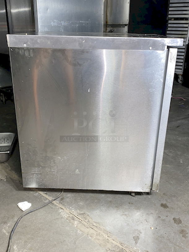 DON'T MISS OUT! Delfield Model No. 406 27" Undercounter Refrigerator, single-section on Commercial Casters.  Tested. Turns On. Quickly Gets Down To and Holds Temperature. 115v/60/1-ph, NEMA 5-15P std. 27"W, 5.7 cu. ft, (1) right han hinged door, stainless steel top, front & sides, ABS interior, 6" legs, rear-mounted refrigeration system, 1/5 hp, 2" NSF certified casters (set of four 2/locking) for undercounter applications - Image 5 of 8