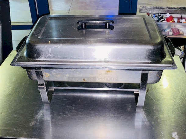 BEAUTIFUL! 8 Qt. Full Size Stainless Steel Chafer. 24x14-1/8x13
Includes: Full size chafer frame, 4" deep water pan, 2 1/2" deep food pan, 2 1/2" high lid with black handle, Fuel holder tray
 - Image 1 of 7