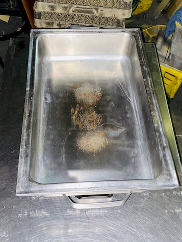 BEAUTIFUL! 8 Qt. Full Size Stainless Steel Chafer. 24x14-1/8x13
Includes: Full size chafer frame, 4" deep water pan, 2 1/2" deep food pan, 2 1/2" high lid with black handle, Fuel holder tray
 - Image 4 of 7