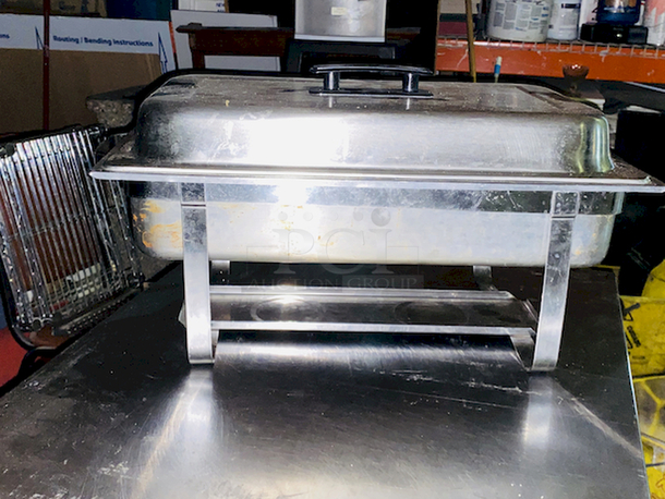 BEAUTIFUL! 8 Qt. Full Size Stainless Steel Chafer. 24x14-1/8x13
Includes: Full size chafer frame, 4" deep water pan, 2 1/2" deep food pan, 2 1/2" high lid with black handle, Fuel holder tray
 - Image 7 of 7