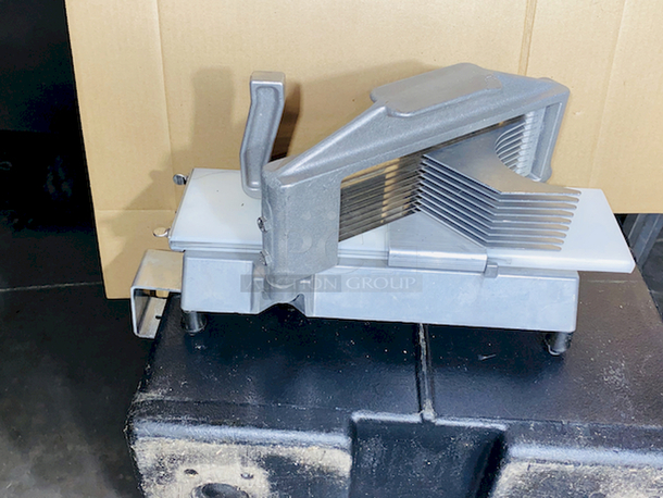 RAZOR SHARP! Nemco 55600-2 1/4" Easy Tomato Slicer and Table Stop.
8x15x8

Razor sharp stainless steel blades create uniform, 1/4" thick slices without squeezing or crushing
Compact, portable design allows for use on any countertop and provides easy storage
Ergonomic vertical handle for effortless slicing
Protective guards keep hands safe during use
Rubber feet prevent slipping to ensure maximum stability - Image 5 of 8