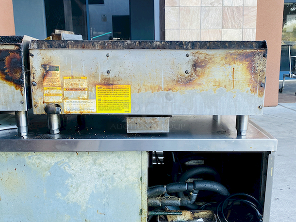 BUILT FOR HEAVY USE! Vulcan MSA-36-101 36" Countertop Natural Gas Griddle with Snap-Action Thermostatic Controls - 81,000 BTU. Width 36 Inches Depth 31 1/2 Inches Height 15 1/4 Inches Cooking Surface Width 36 Inches Cooking Surface Depth 24 Inches Stainless steel front, sides and front top ledge. Fully welded stainless and aluminized steel body frame. 11" low profile cooking height on 4" legs. 1" thick polished steel griddle plate with 12 gage, 4" stainless steel back and tapered side splashes. Grease chute is fully welded to stop grease migration. One 27,000 BTU/hr. “U” shaped aluminized steel burner and mechanical snap action thermostat for each 12" of griddle width. Chrome thermostat knob guards. Temperature adjusts from 200° to 550° F. One pilot safety for every two burners. - Image 4 of 8